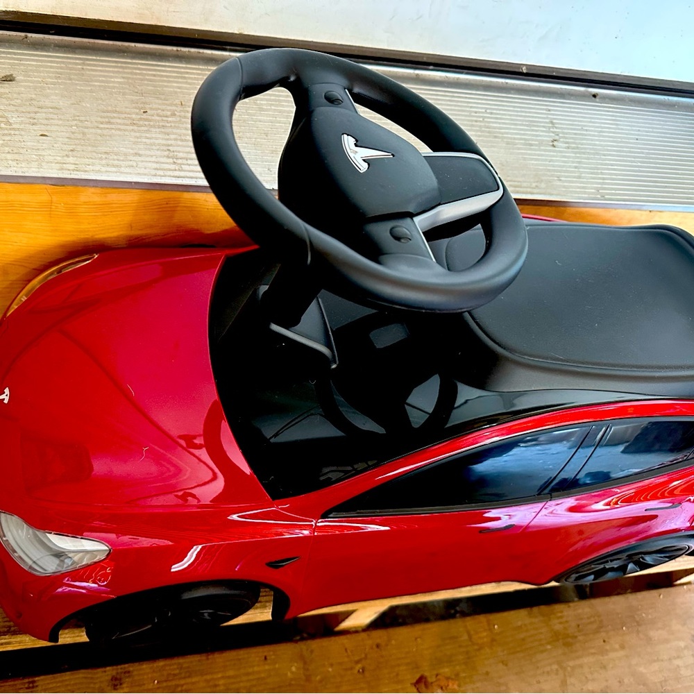 Kids radio flyer Tesla ride on toy car